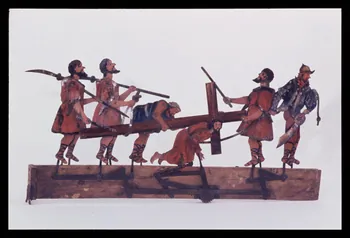 Alain Guey photographie "La passion de Jésus Christ" : le Christ portant sa croix aidé de Simon. Personnages articulés provenant d'un théâtre mécanique (Paris) Ile-de-France, France 1970/2/1 Ph.1970.4.233 Photo