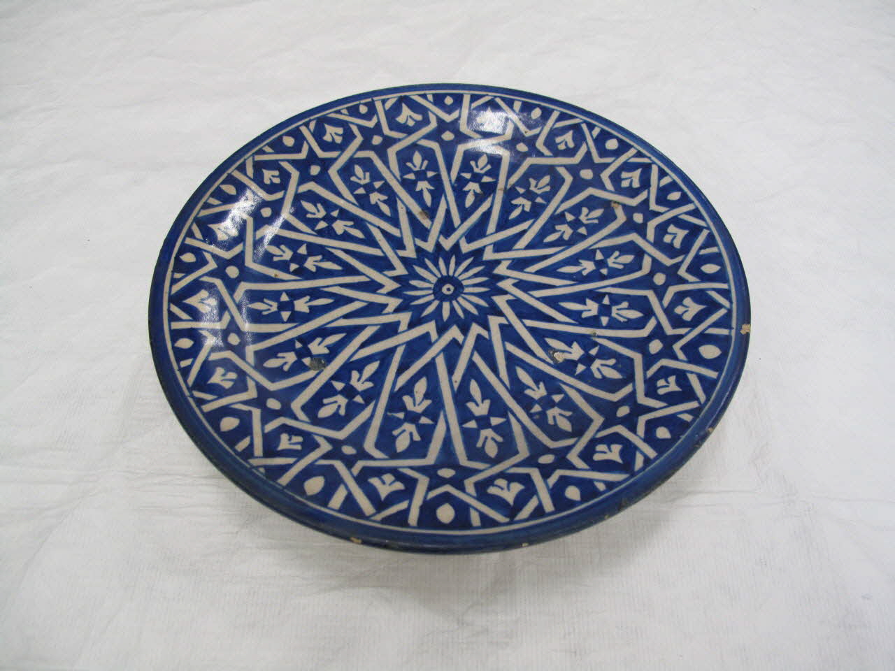 plat Plat à décor d'étoile Fès-Meknès, Maroc 1875-1900 2013.10.34 Photo Mucem