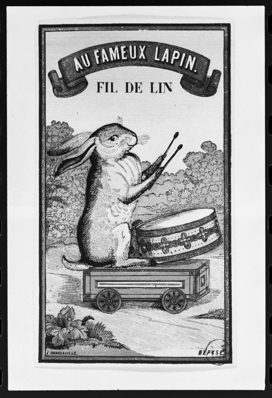 photographie Carte publicitaire pour un mercier, illustrée par un lapin. "Au fameux Lapin". Reproduction industrielle couleur. Fil de lin Ph.1981.2.4 Photo