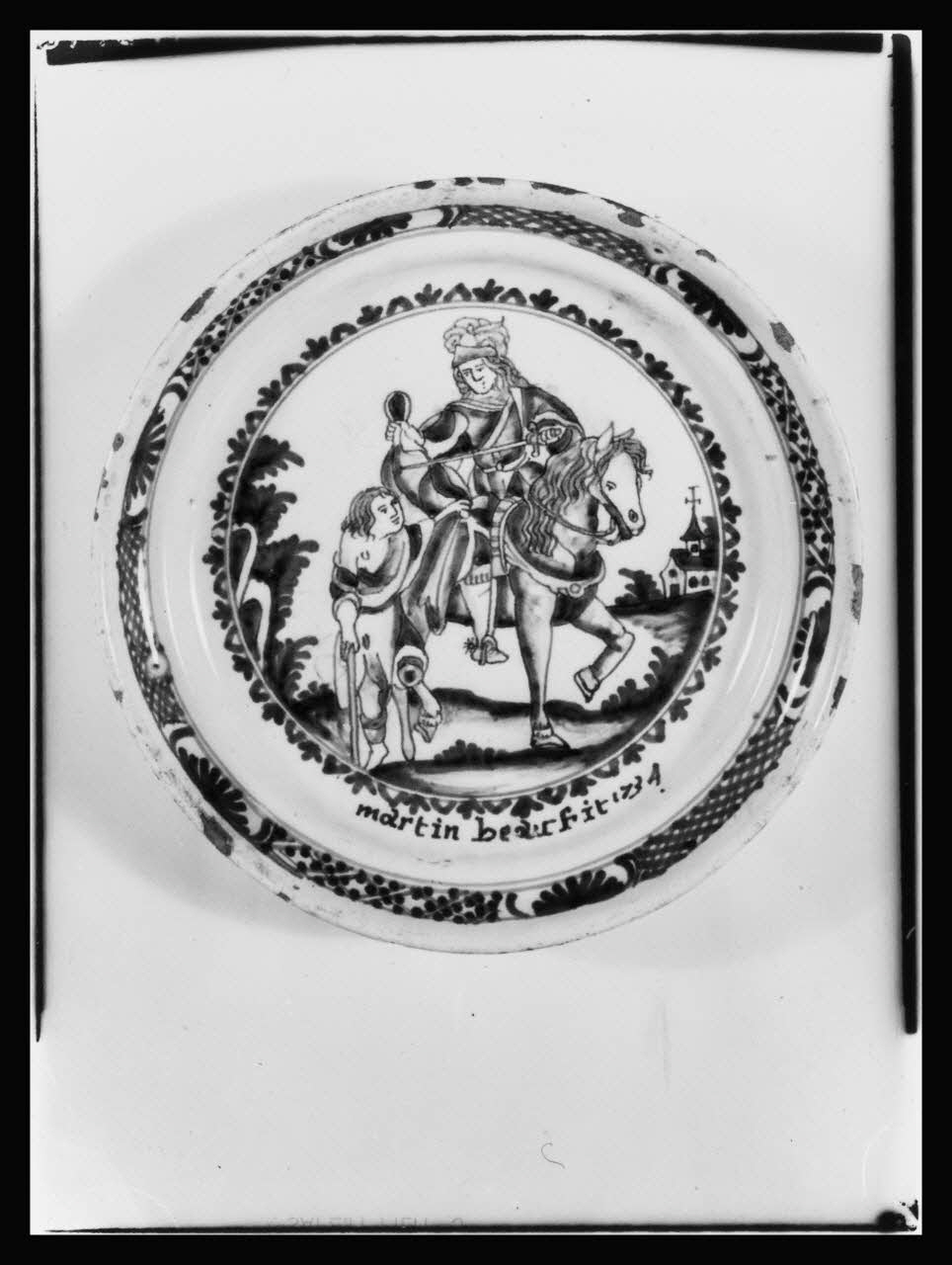 A. Chastanier photographie Assiette représentant "Saint-Martin partageant son manteau". Faïence. Datée de 1734 Rhône-Alpes, France 1973 Ph.1973.204.23 Photo