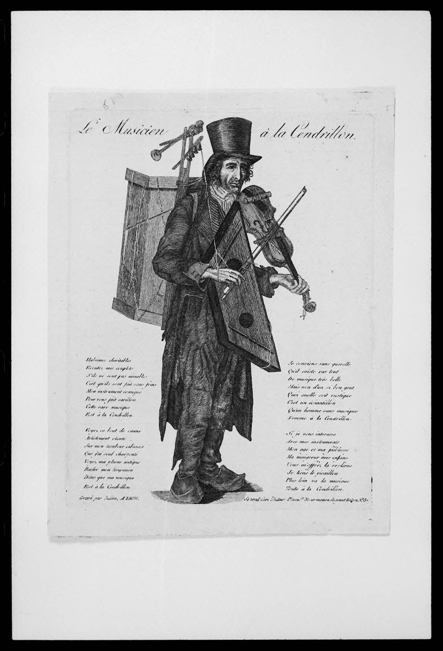 photographie "Le musicien à la Cendrillon". Estampe accompagnée d'un texte. Taille douce noir et blanc. Maison Julien à Lyon(1802-1837) Ph.1988.2.181 Photo