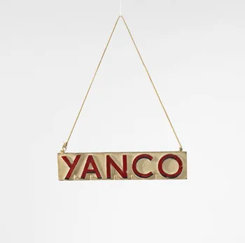 Jean-Louis Conte enseigne Enseigne Yanco, porte accessoires France 1955-1985 2024.3.4  Photo Mucem / Marianne Kuhn