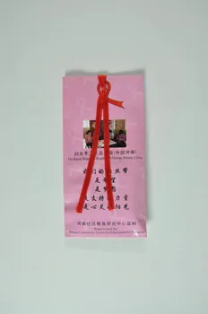 The Rural Women Handicraft Group, Hena, Chine & pochette Pochette contenant des rubans rouges dans enveloppe International 2004 2004.207.171.1 Photo Mucem