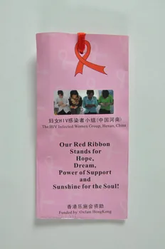 The Rural Women Handicraft Group, Hena, Chine & pochette Pochette contenant des rubans rouges dans enveloppe International 2004 2004.207.171.2  Photo Mucem