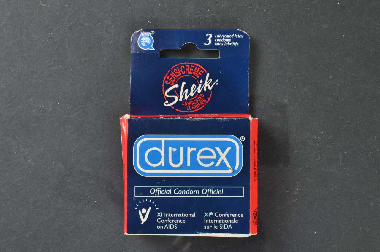 Durex boîte "Durex. Official condom XI° International Conference on AIDS" (sans préservatif) (Préservatif officiel de la XI° conférence internationale du sida) Canada 2001 2003.125.672 Photo Mucem