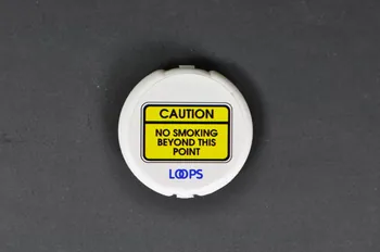 Loops Etui de préservatif et gel "Caution. No smoking beyond this point" France 2000 2003.125.738 Photo Mucem