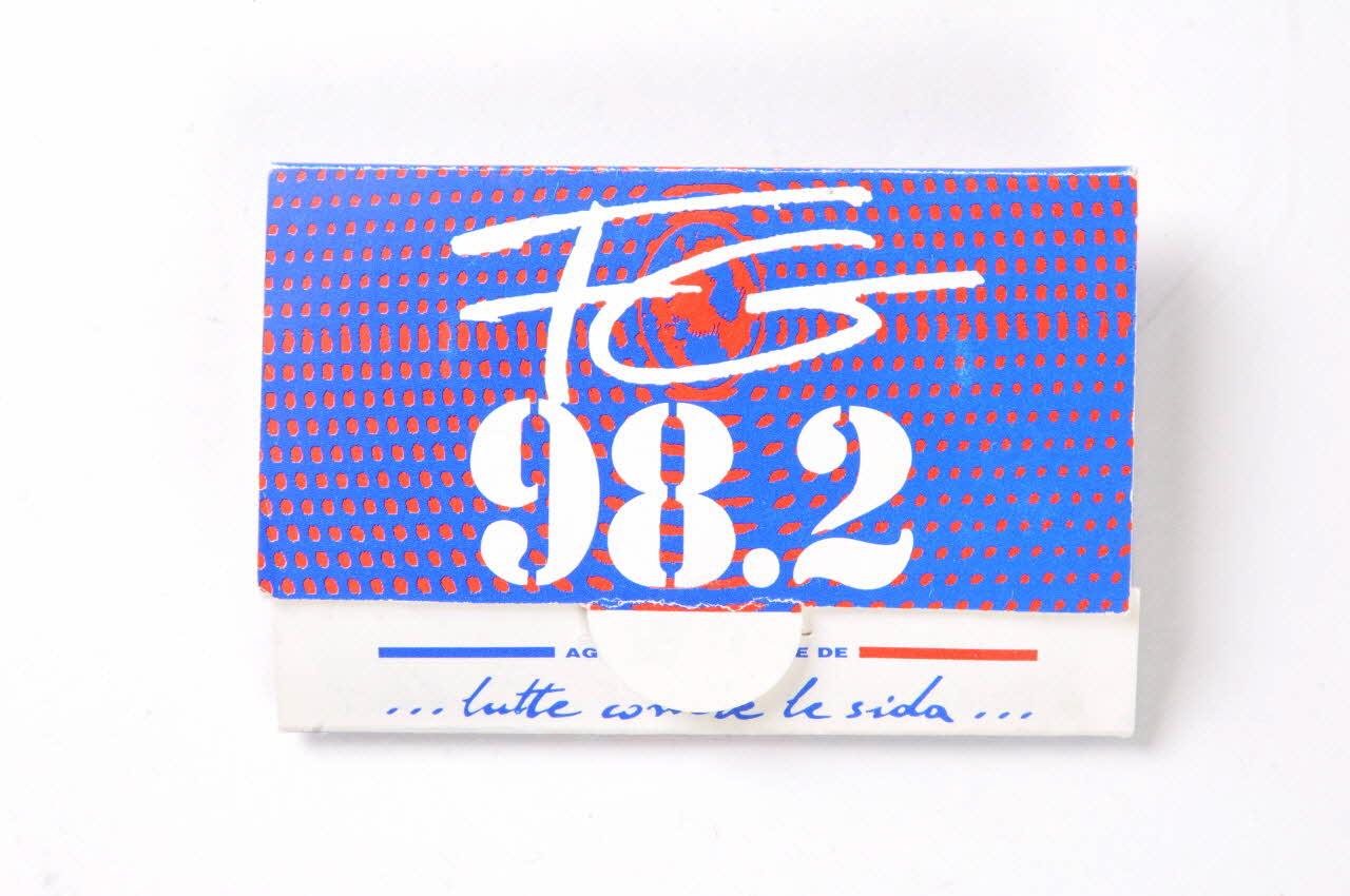 Radio Fg, Afls Préservatif Etui de préservatif  "Sortez couvert avec FG" France 1997 2003.125.789 Photo Mucem