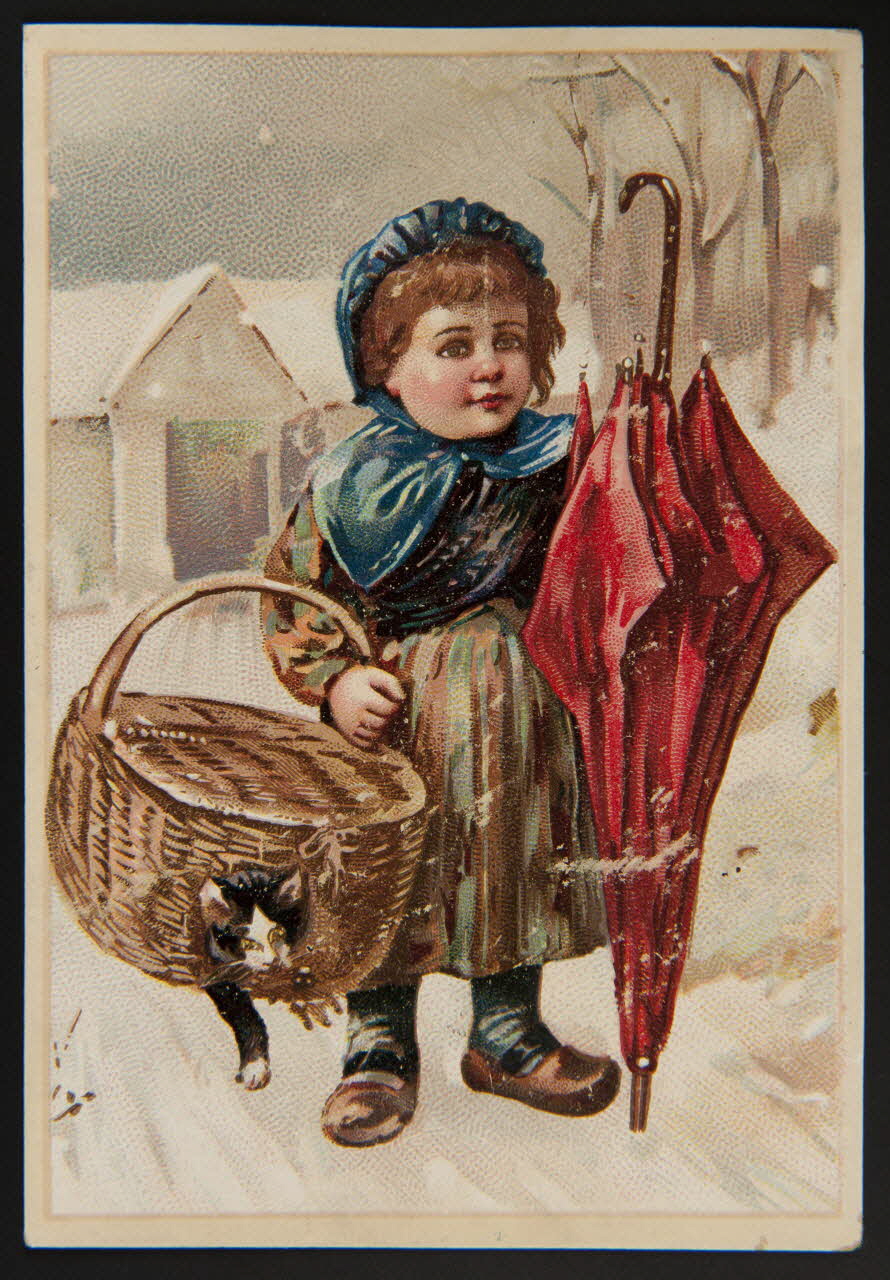 Carte réclame Enfant sous la neige portant un panier avec un chat 1996.40.1641.2 Photo