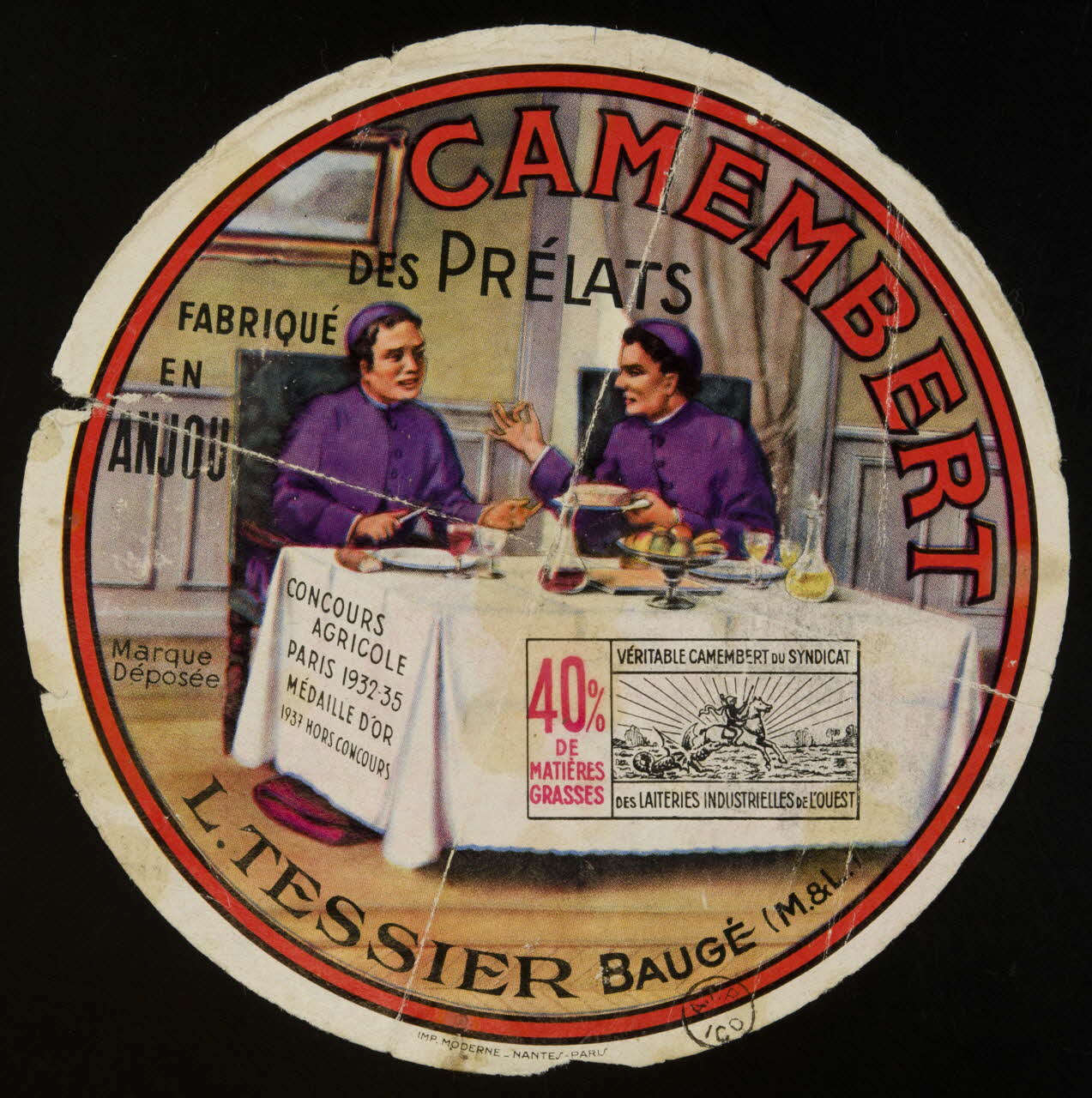 ETIQUETTE DE CAMEMBERT Camembert  DES PRELATS  FABRIQUE  EN  ANJOU  L.TESSIER BAUGE (M. & L.) 1950.35.1 Photo