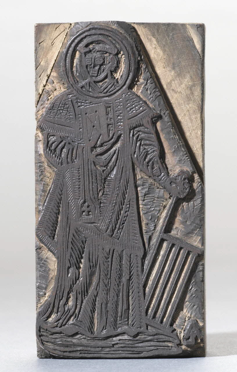 bois d'impression Saint Laurent (?) debout appuyé sur son gril 1971.34.1 Photo RMN-Grand Palais (Mucem)