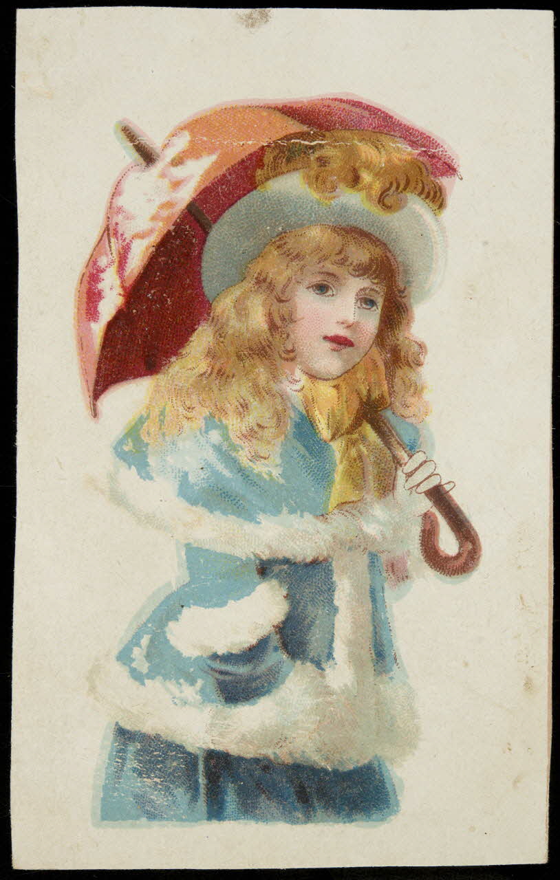 carte réclame Une jeune fille en manteau bleu s'abrite sous un parapluie rouge 1998.77.179.1 Photo