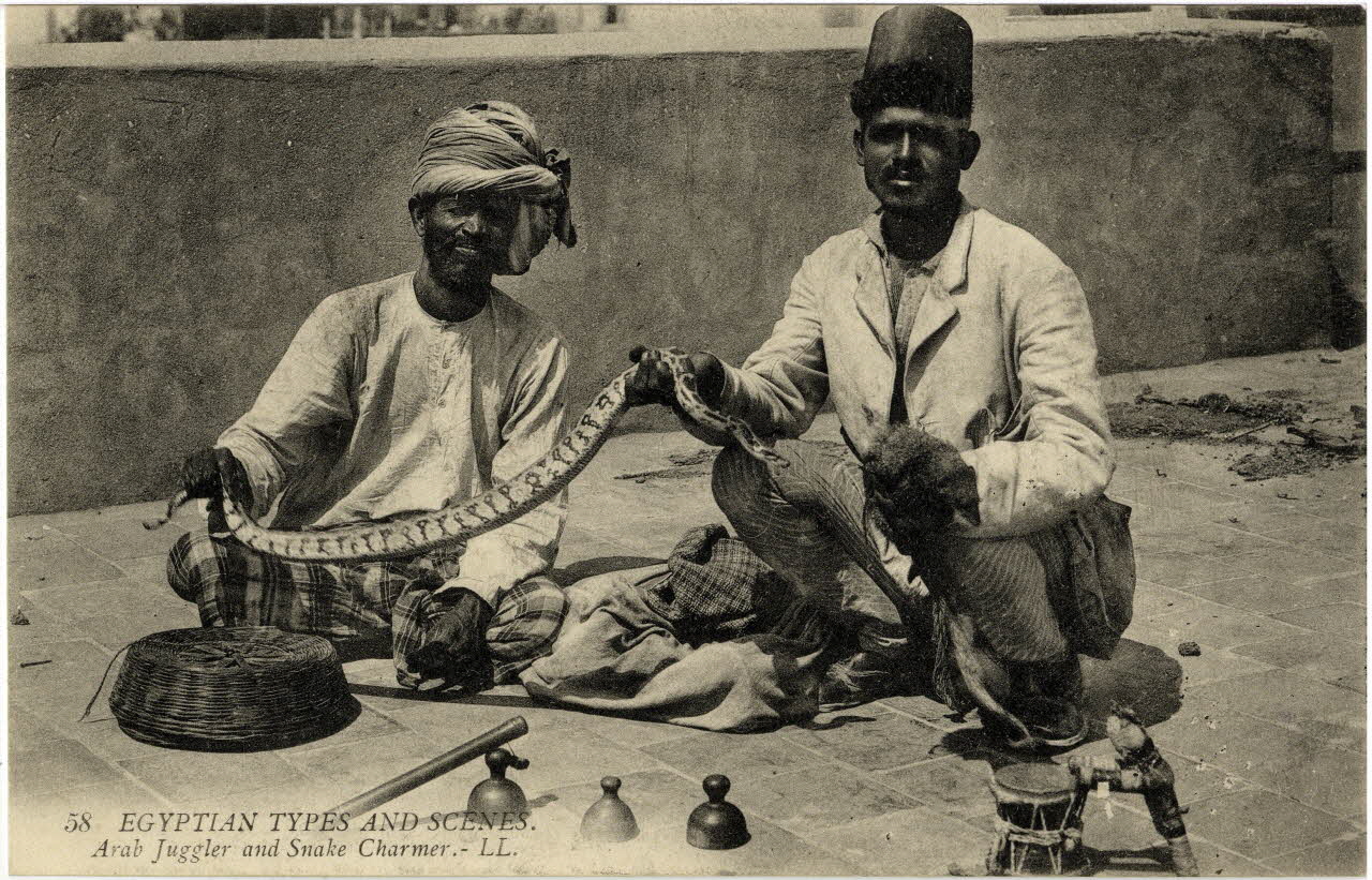58. Egyptians types and scenes. Arab juggler and snake charmer. Sou.10.105.1 Photo